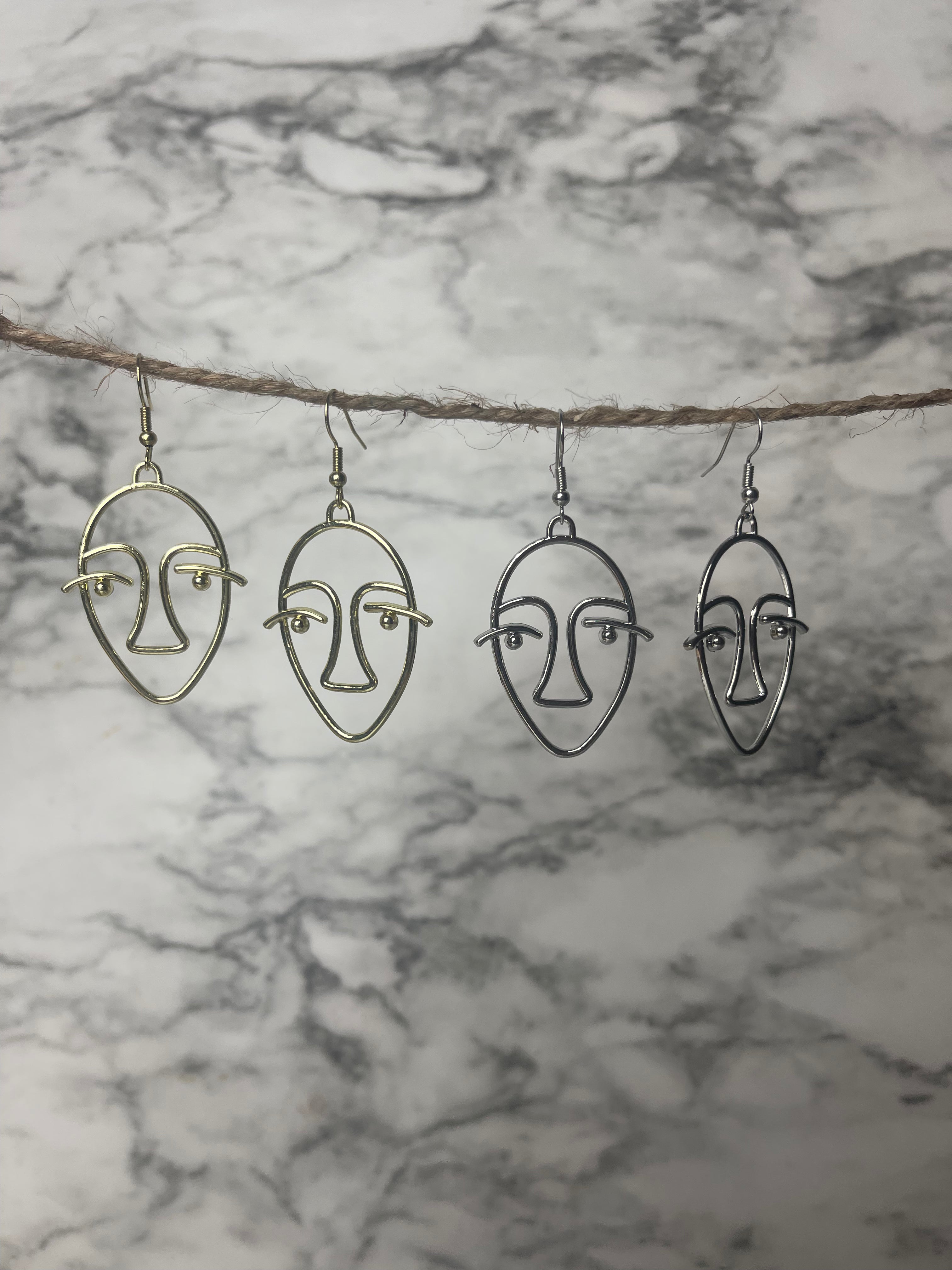 Face Silhouette Cut Out Earrings
